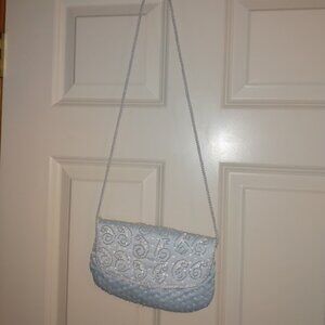 Vintage light blue beaded purse with corded strap.